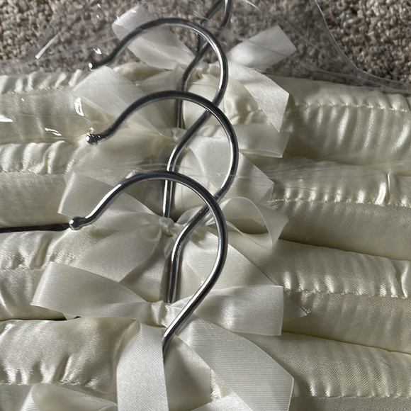 Brand new in package cream color satin hangers. Pack of 5 have multiple packs - Picture 3 of 4
